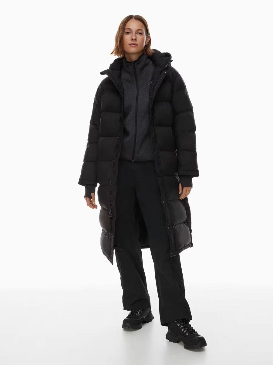 Black long hooded puffer coat with zip front and extended side hem
