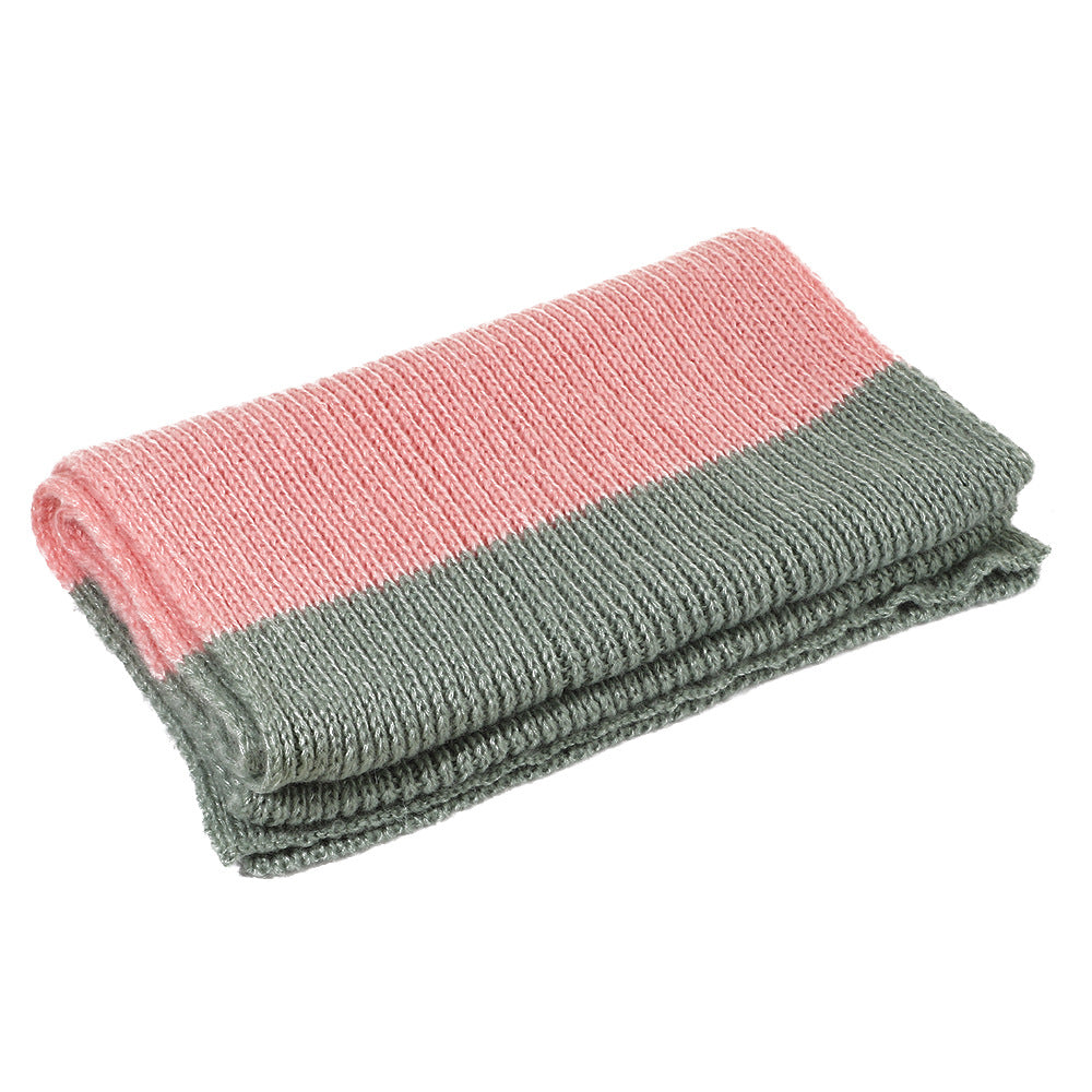 Folded knit scarf with coral-pink and dark-green horizontal stripes