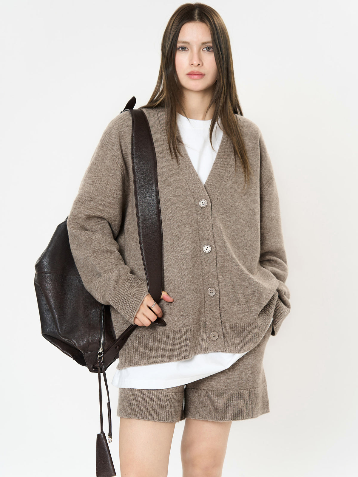 Women's wool knit V-neck cardigan, beige button-front with long sleeves