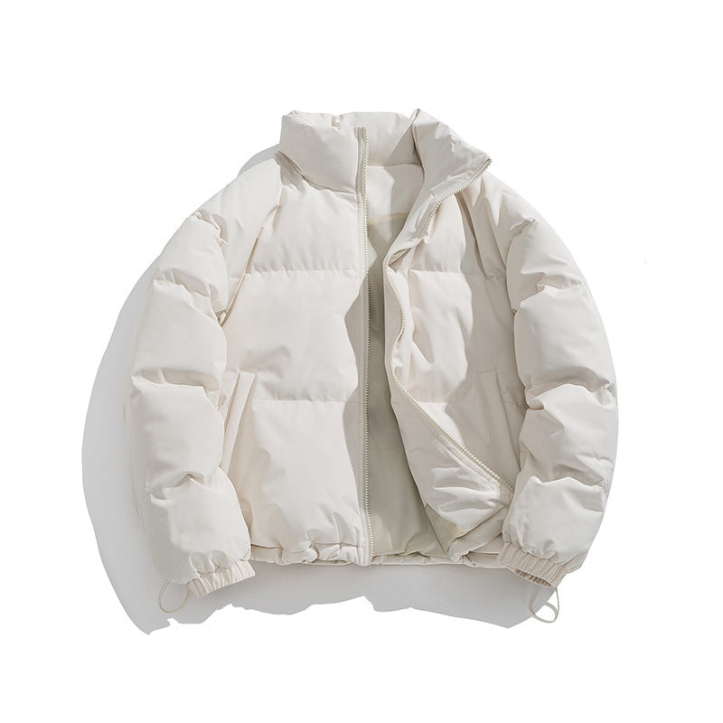 White quilted puffer jacket with stand collar and full front zipper.