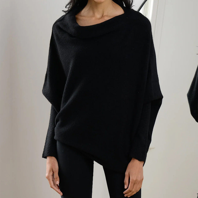 Black loose-fit pullover sweater with round neckline and long sleeves