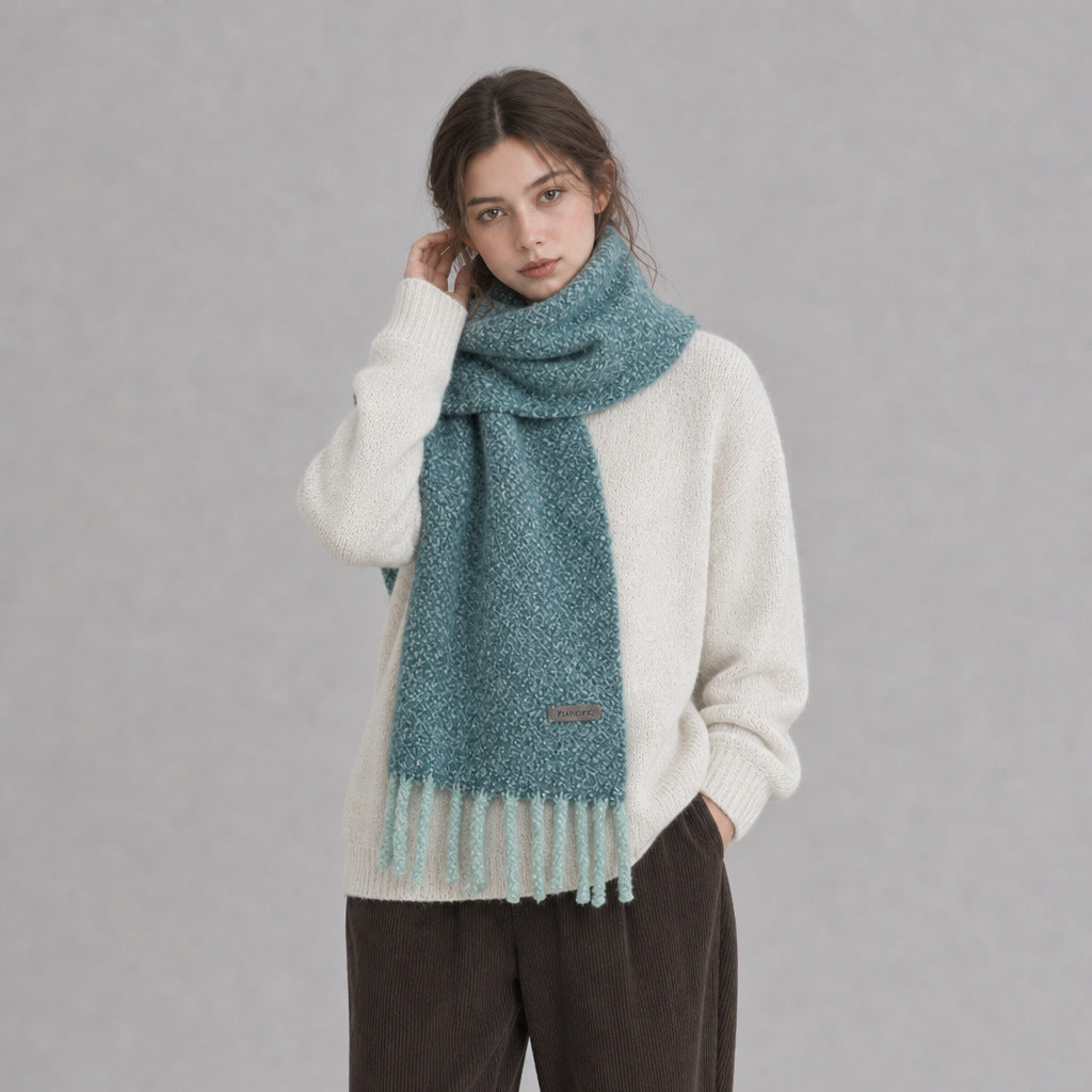 Chunky loop-knit scarf shawl in lake blue with fringed hem and small center label