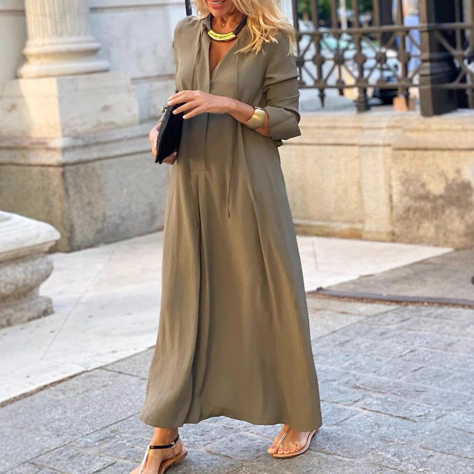 Khaki linen maxi dress with long sleeves, V-neck and flowing full-length skirt