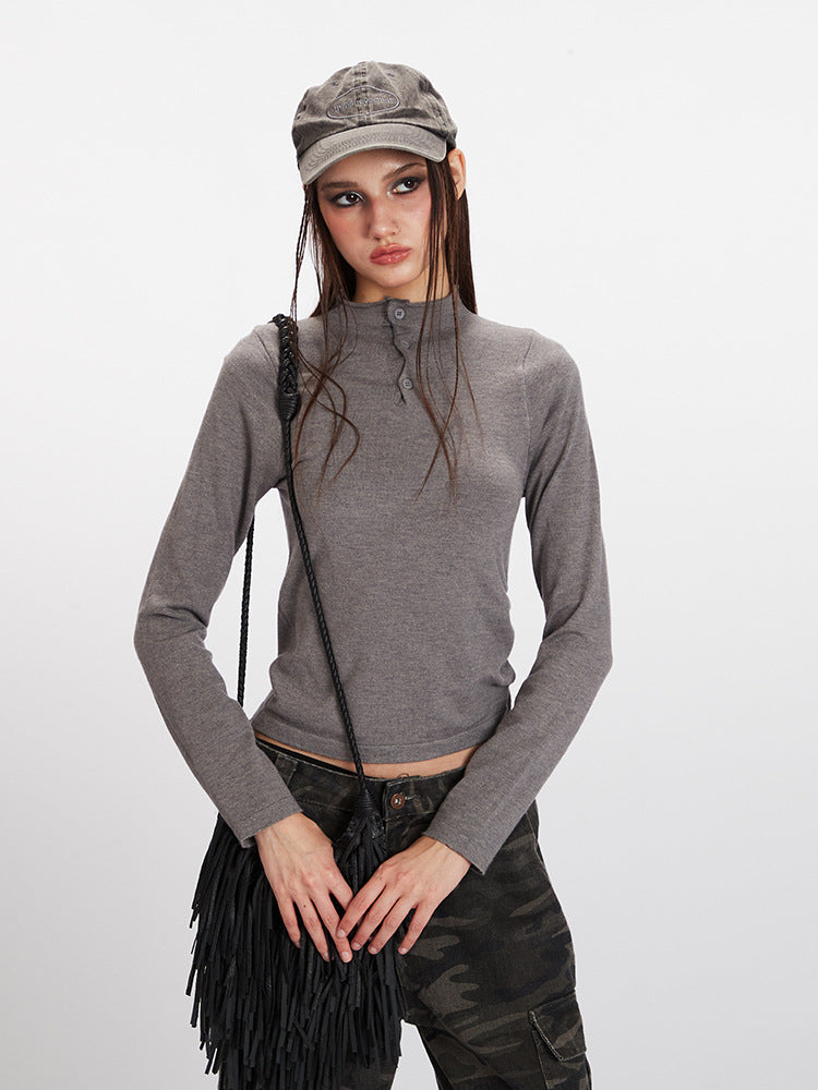 Women’s gray knit sweater with stand collar and button placket, long sleeves