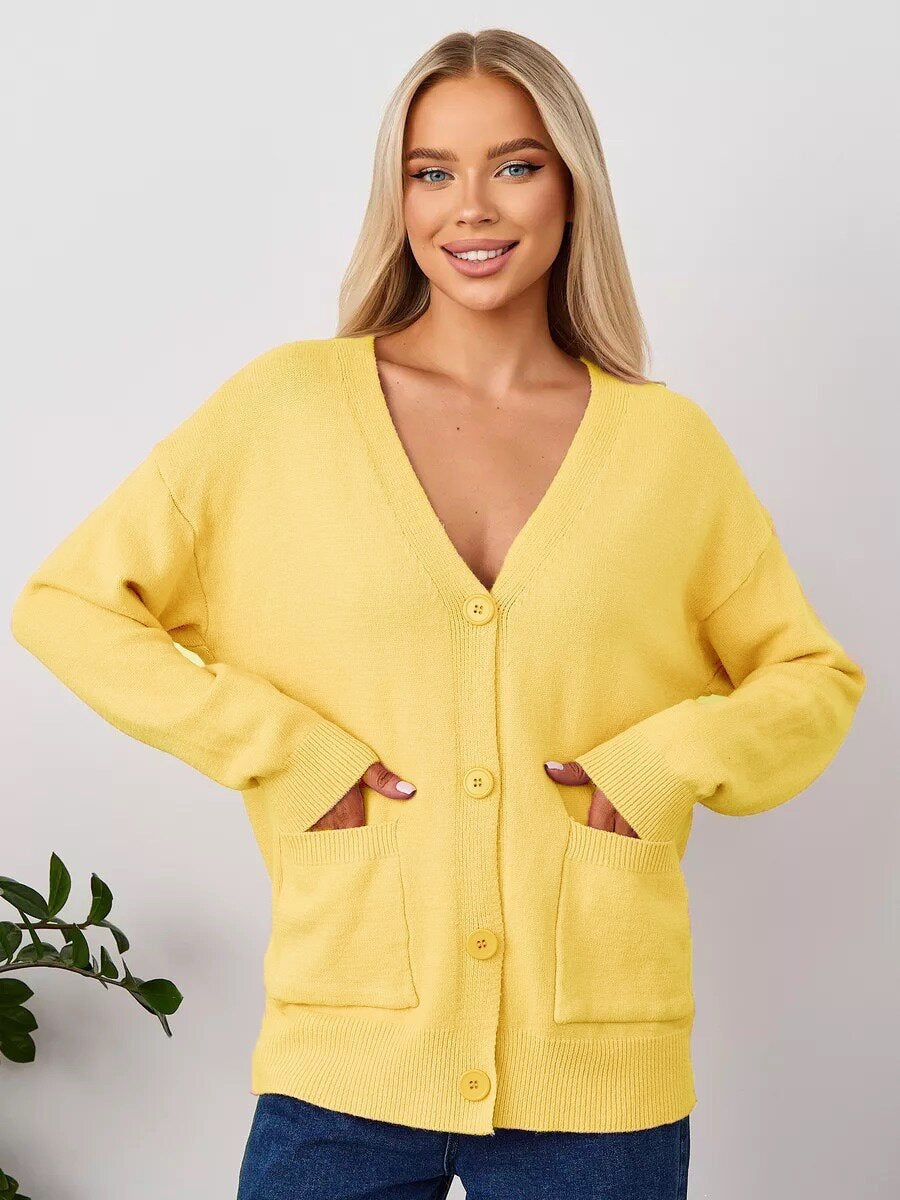 Women's yellow knit V-neck cardigan with button front and front pockets, long sleeves