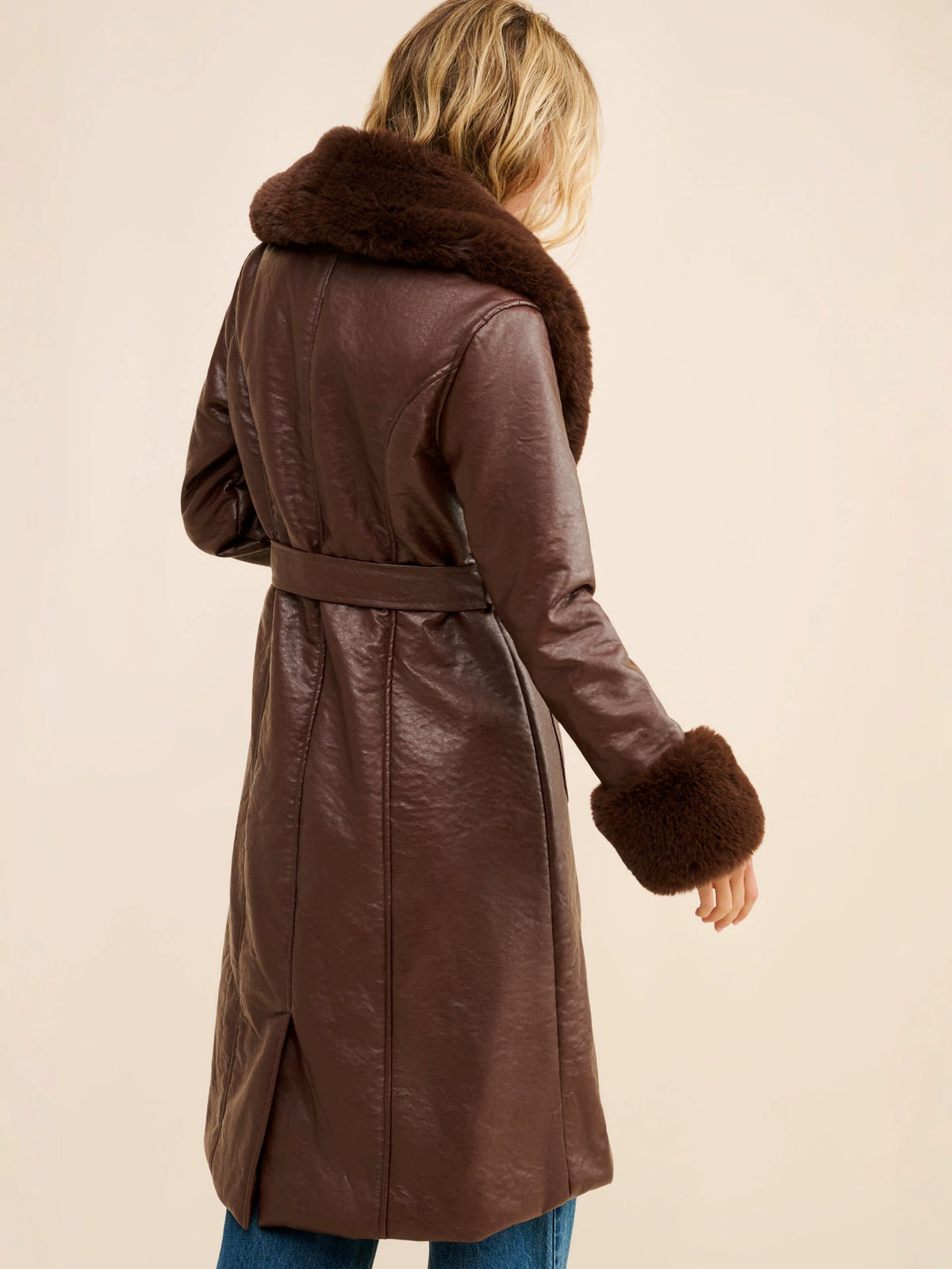 Brown long coat back view, faux fur collar and cuffs with leather-look belt