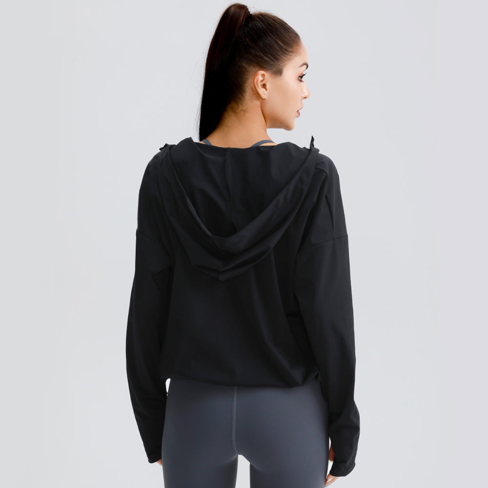 Black hooded zip-up jacket for women, long sleeves, back view