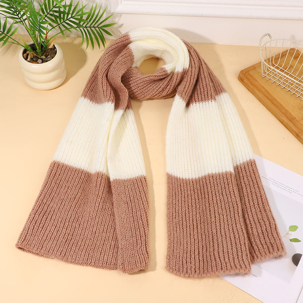Brown and white striped knit scarf, folded with ribbed texture