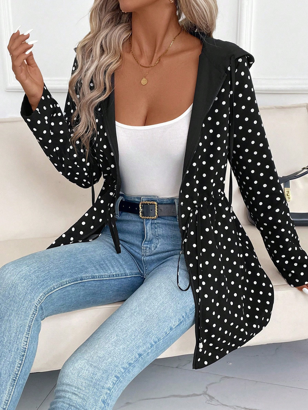 Reversible polka-dot hooded zip jacket in black with tie hood