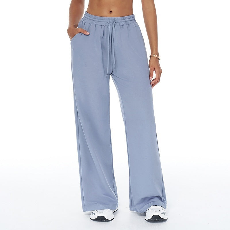 High-waisted loose sweatpants with straight legs, drawstring waist, light blue