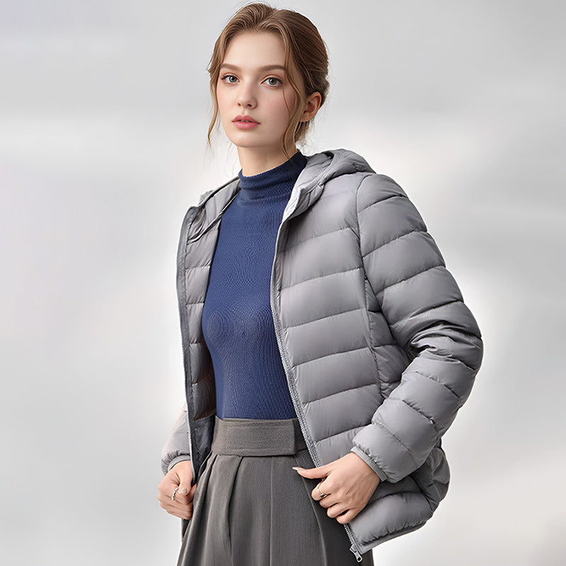 Women's light gray hooded down jacket, shown open with horizontal quilting.