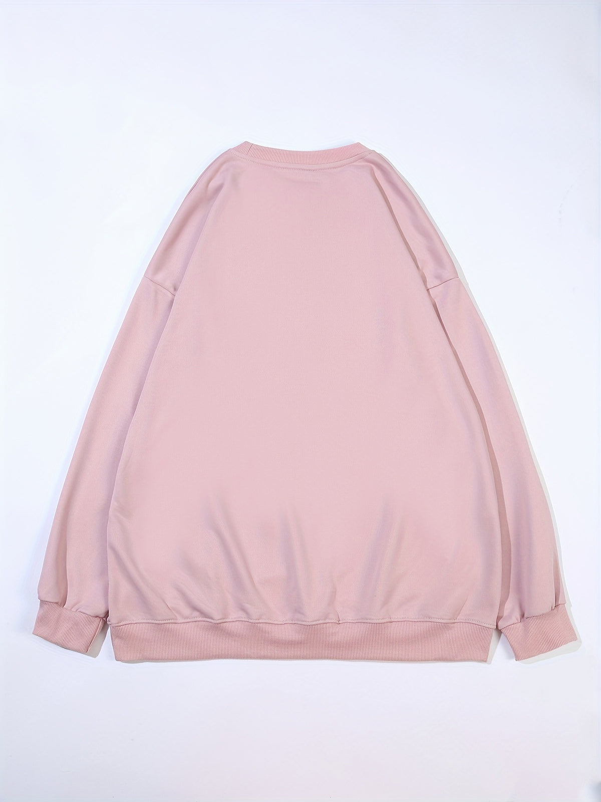 Light pink women’s pullover hoodie with long sleeves and plain back