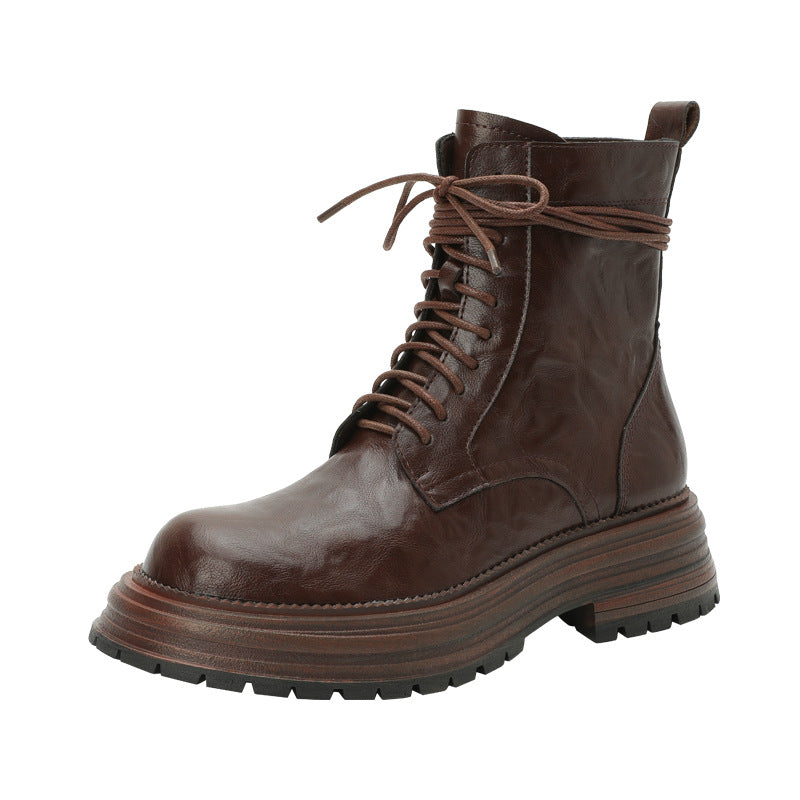 Brown lace-up ankle combat boots with rugged tread sole and padded collar