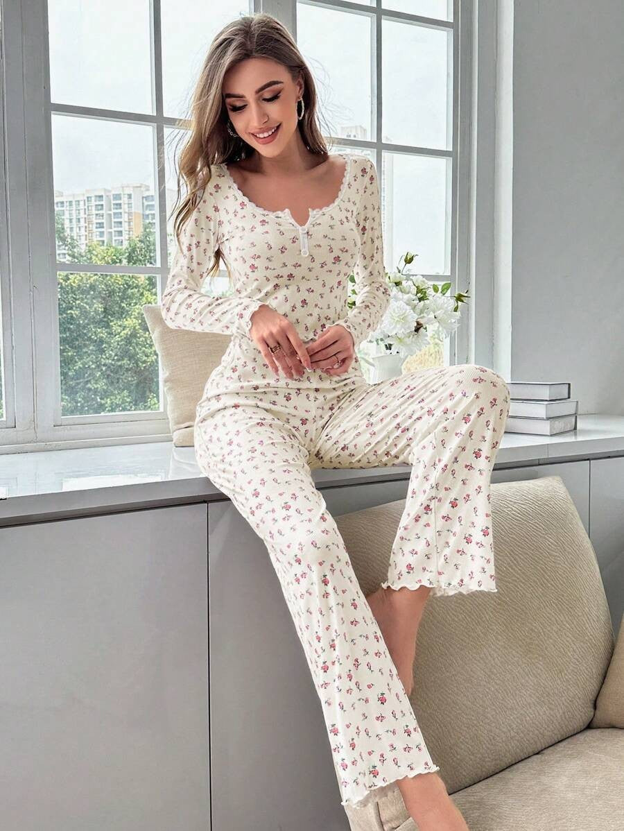 Women’s cream floral pajama set with long sleeves, button front, and matching long pants