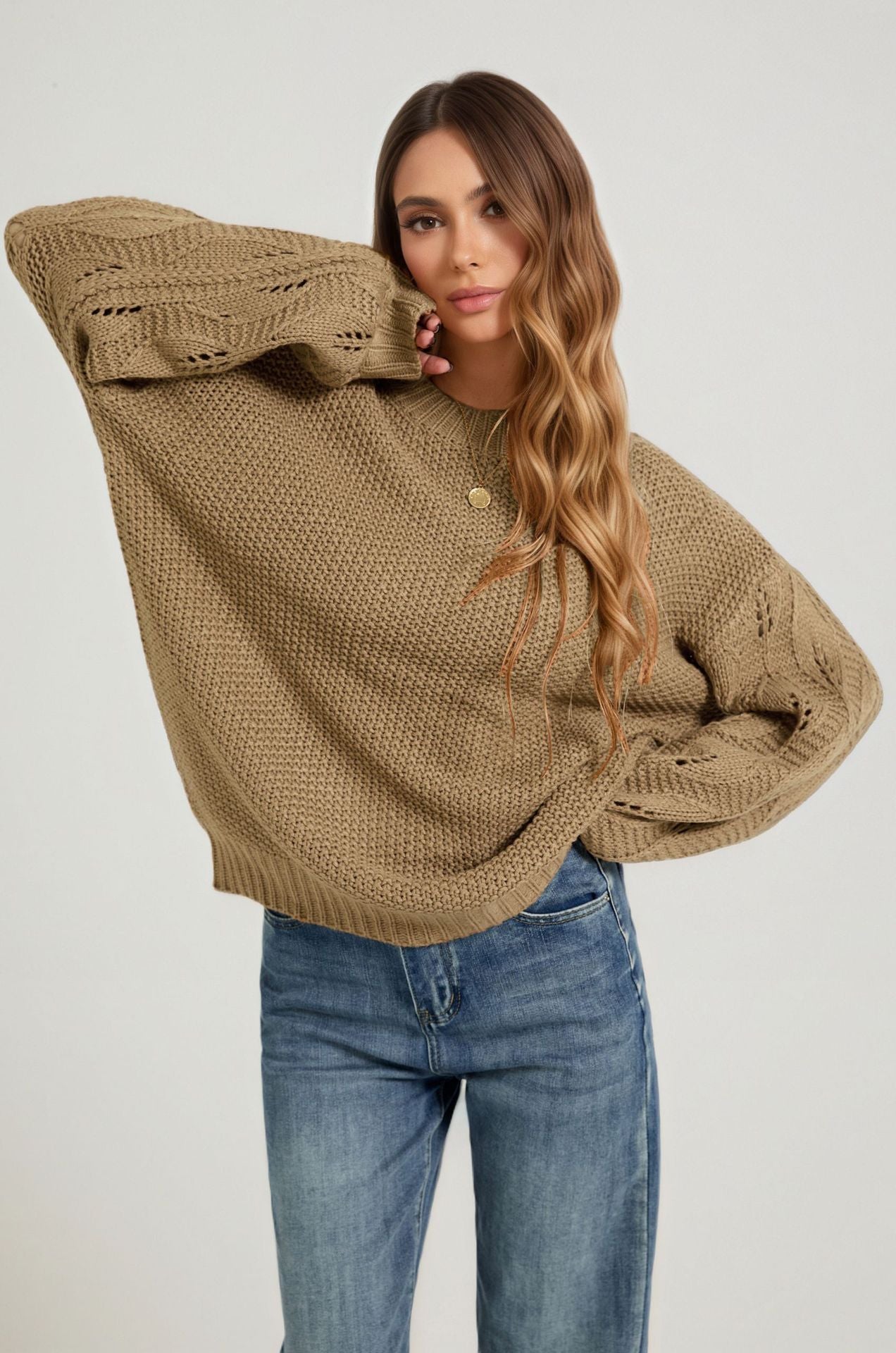 Camel open-stitch sweater with long sleeves and crew neckline, front view