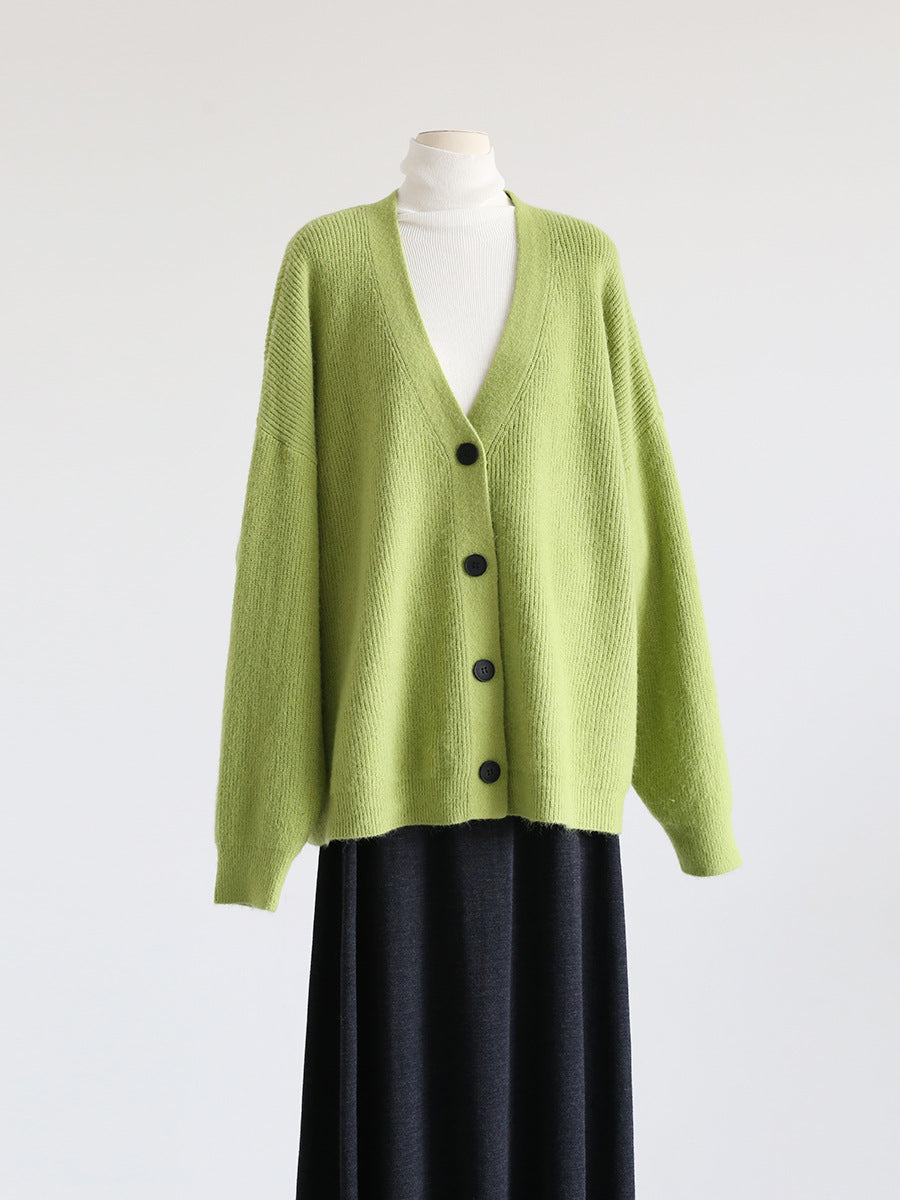 Green V-neck mohair cardigan with button front and drop shoulders