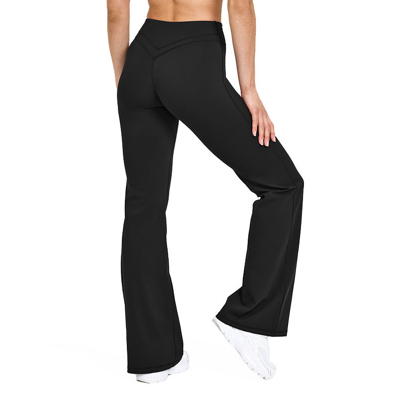 Women’s flared yoga pants in black with high-rise waistband and wide bell legs