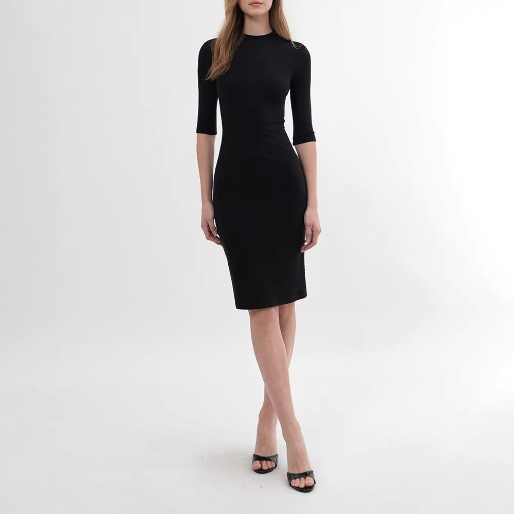 Black mock neck bodycon ribbed knit dress with three-quarter sleeves, midi length