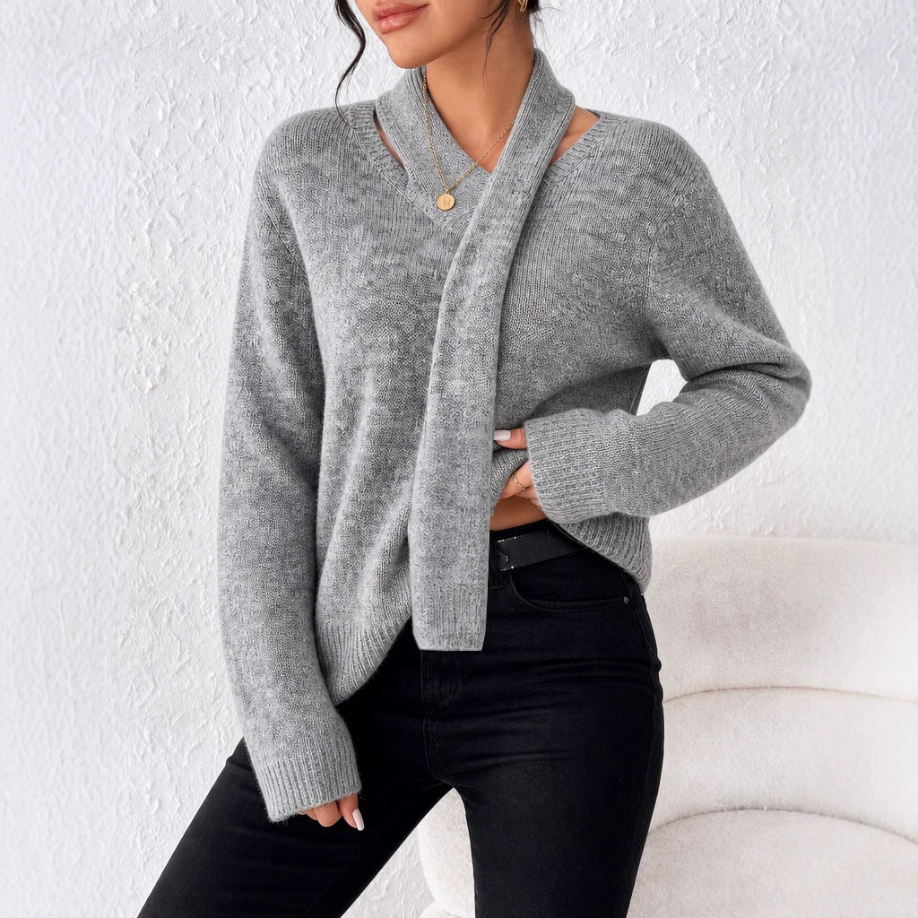 Gray knit pullover sweater with faux wrap V-neck and long sleeves, side view