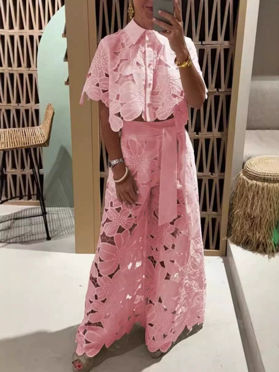 Pink lace cropped blouse with floral cutwork and short sleeves, button front
