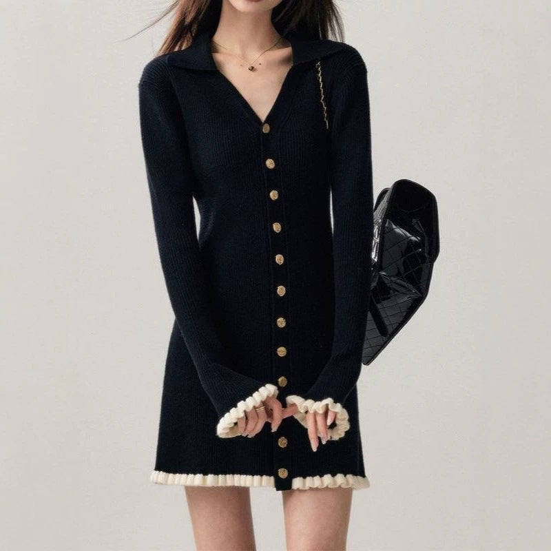 Black collared knit mini dress with long sleeves, gold buttons, ruffle cuffs