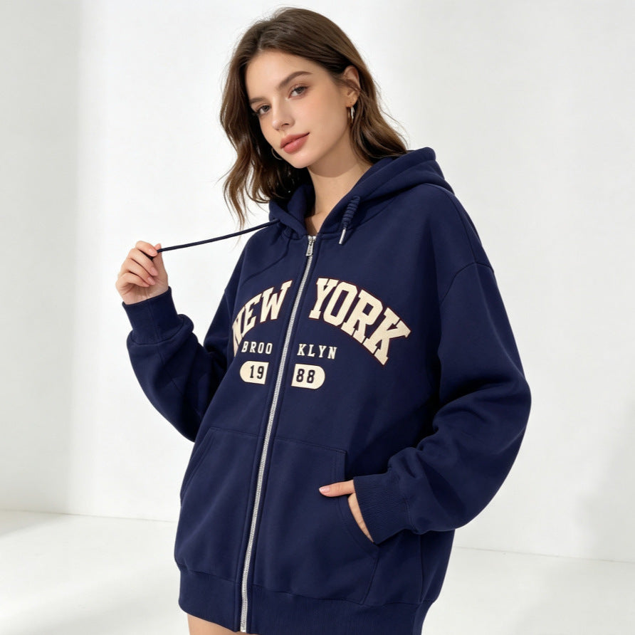 Navy zip-up hooded sweatshirt with NEW YORK and Bklyn graphic, front pockets