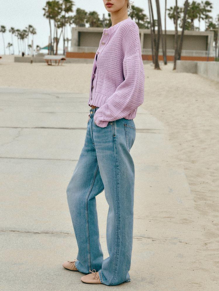 Women's purple short knit cardigan, button front, long sleeves, side view
