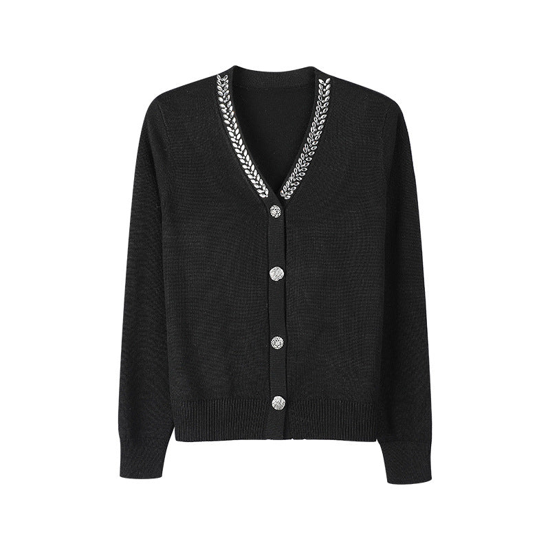 Black V-neck knit cardigan sweater with beaded trim and button front, long sleeves
