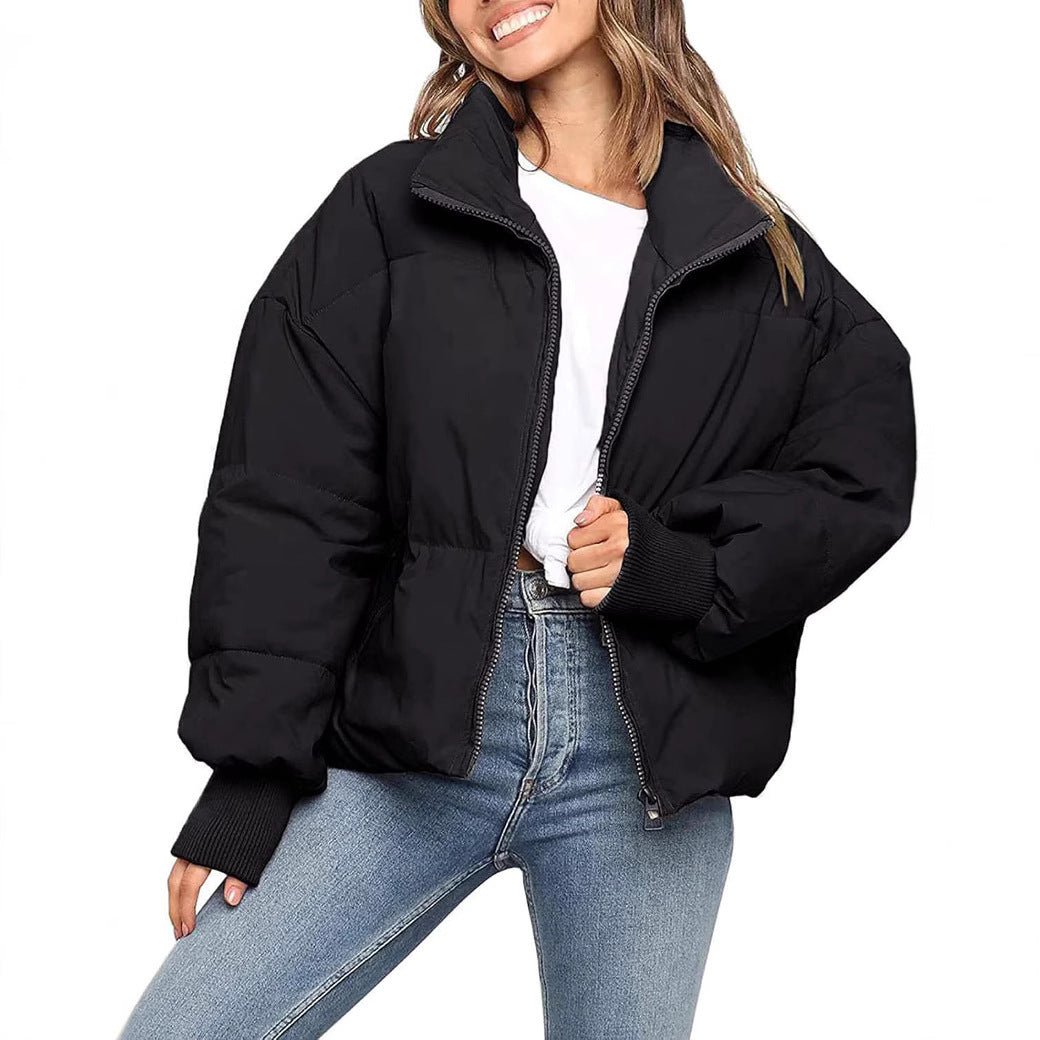 Women’s quilted cotton winter jacket, black, full-zip with ribbed cuffs and collar