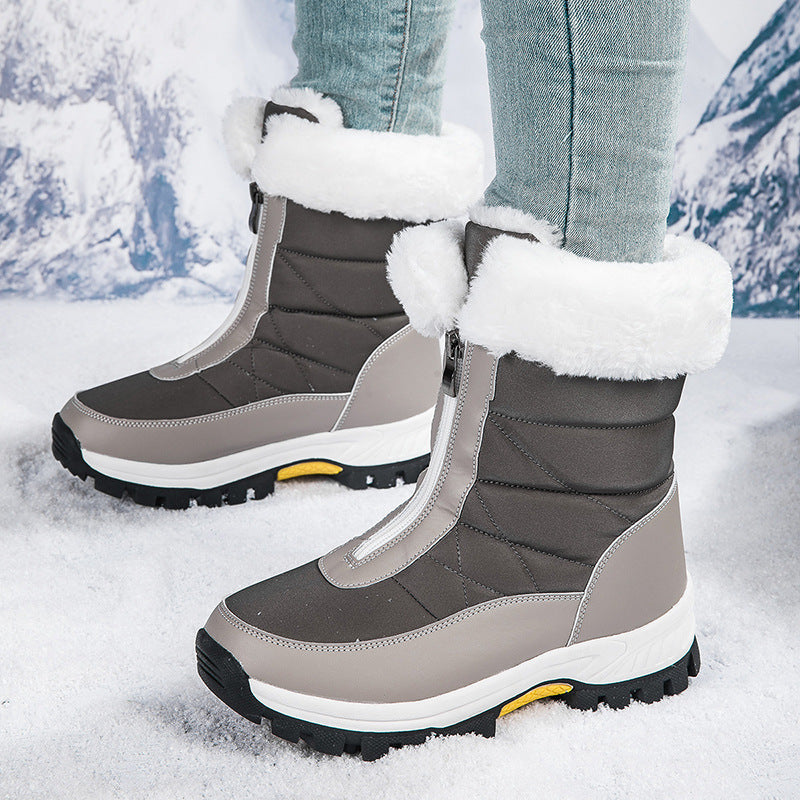 Gray snow boots with white faux-fur cuffs, side zippers, rugged tread sole