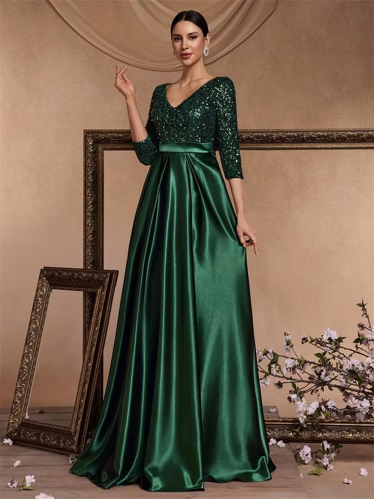 Dark green V-neck sequin evening dress with satin flared skirt and waist belt