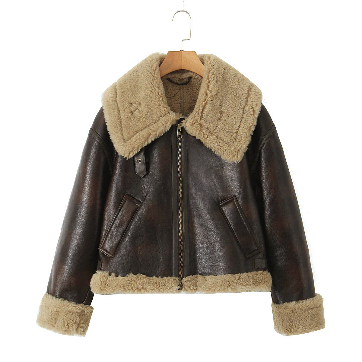 Women's brown leather jacket with tan shearling collar, zip front, and two chest pockets