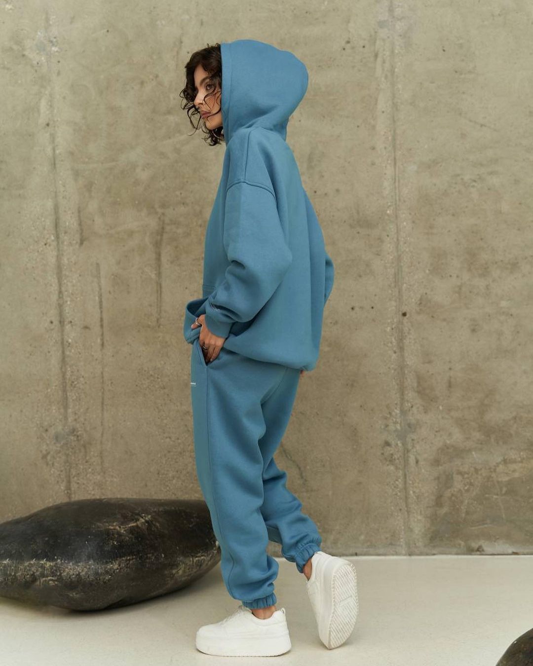 Light blue hooded sweatshirt and matching jogger pants set with side view