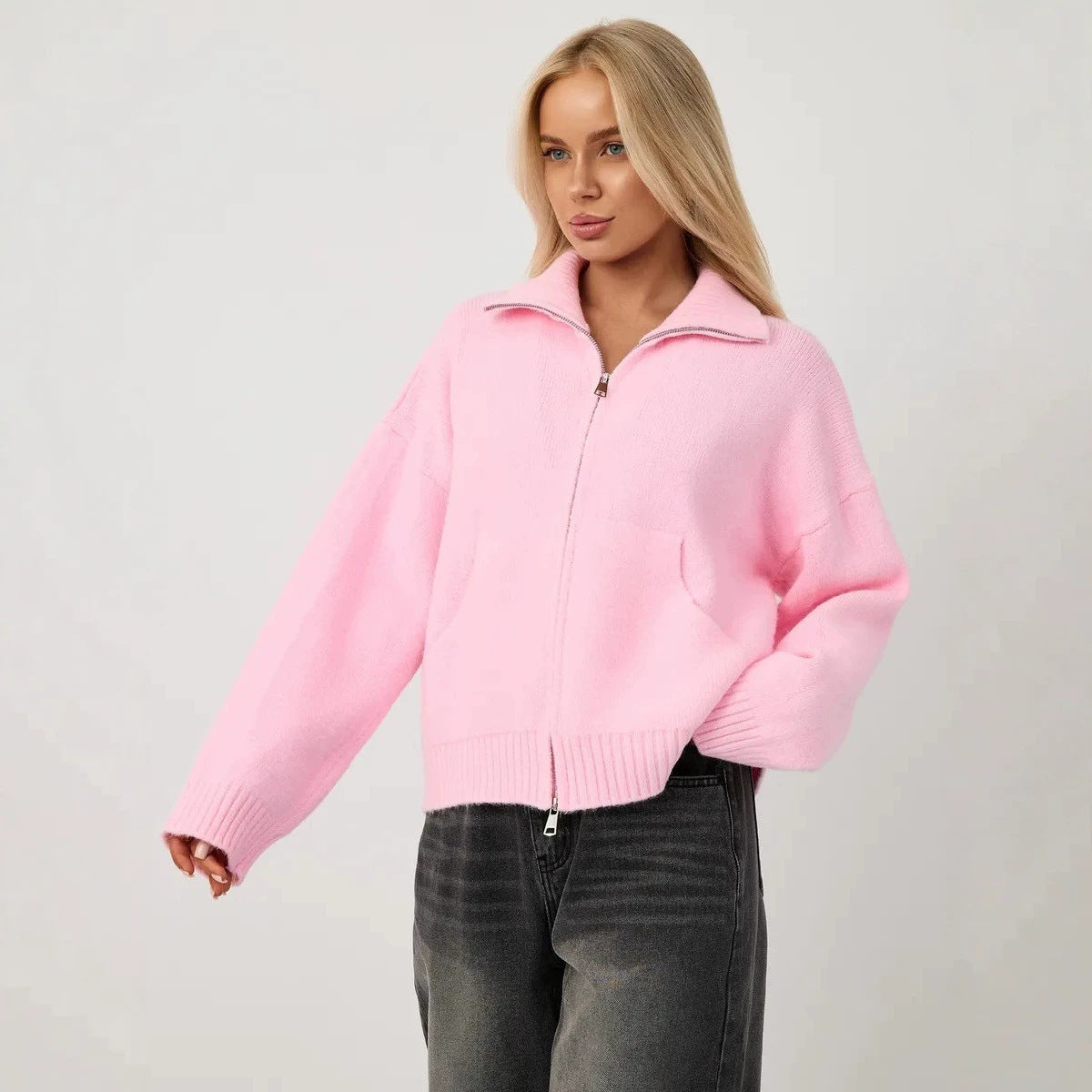 Women’s pink knitted zip-up sweater cardigan with stand-up collar and ribbed hem