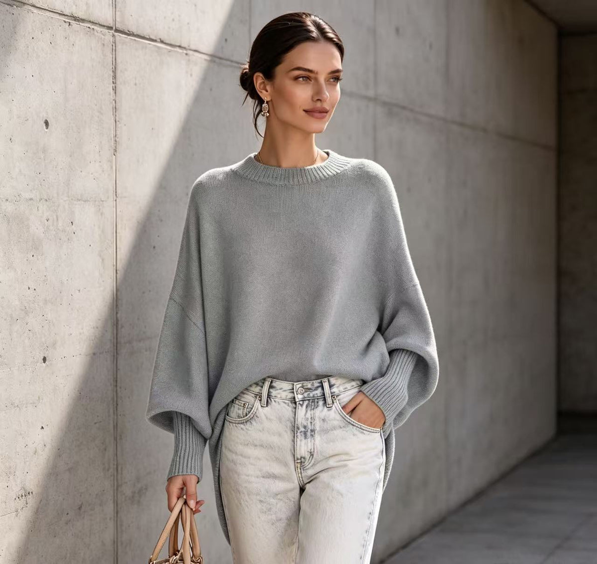 Women’s loose knit sweater, light gray solid color, round neckline, cuffed sleeves