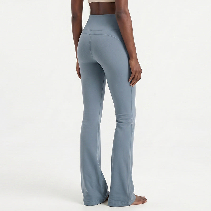 High-waisted flare yoga pants in light blue, smooth seams and wide bell bottom