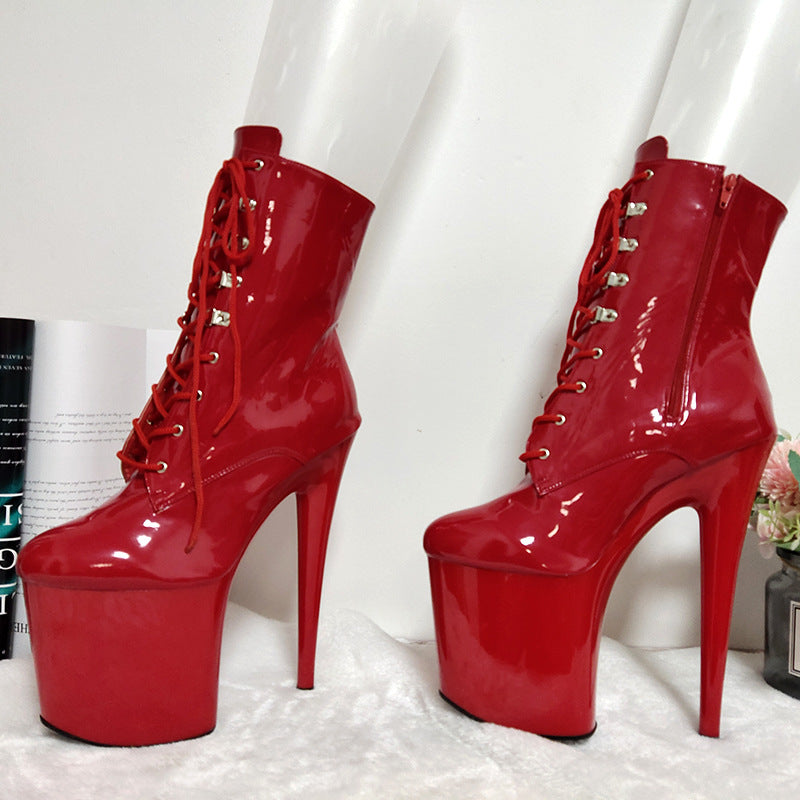 Red glossy lace-up platform ankle boots with tall stiletto heels