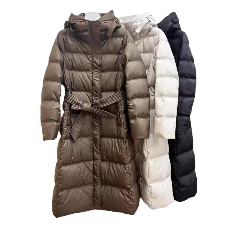 Long belted hood puffer coat, glossy quilted nylon, side-by-side in khaki, white, and black