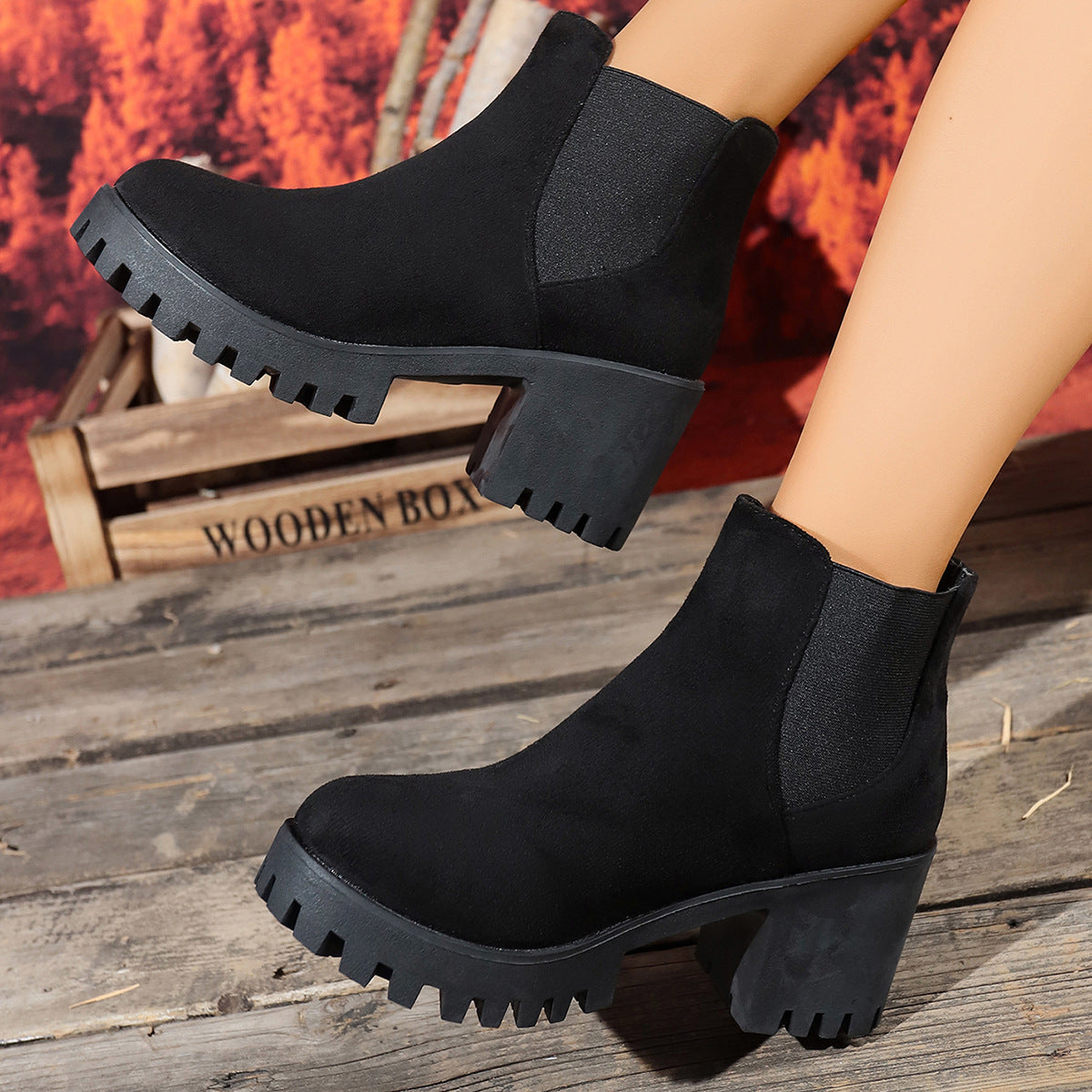Black suede-look ankle boots with chunky tread sole and elastic side panels