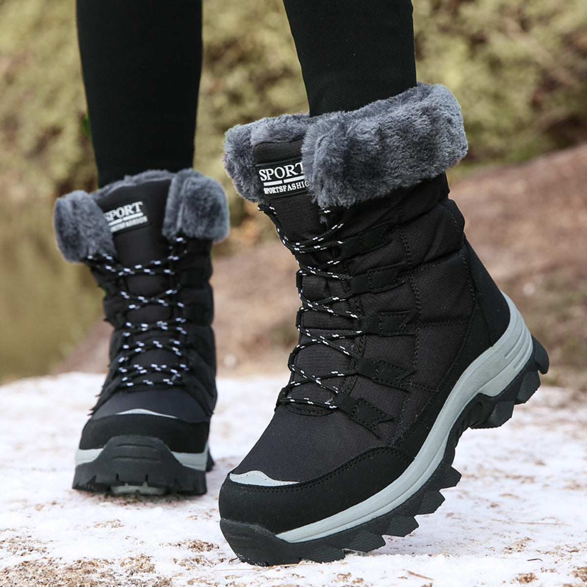 Black lace-up winter boots with gray faux-fur cuffs and chunky tread outsole