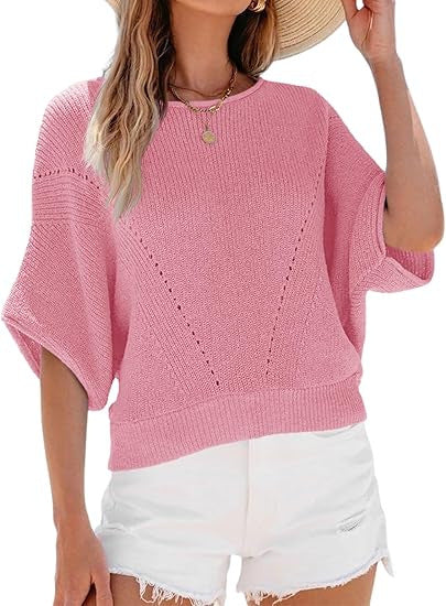 Pink women’s knit pullover sweater with round neck and short batwing sleeves