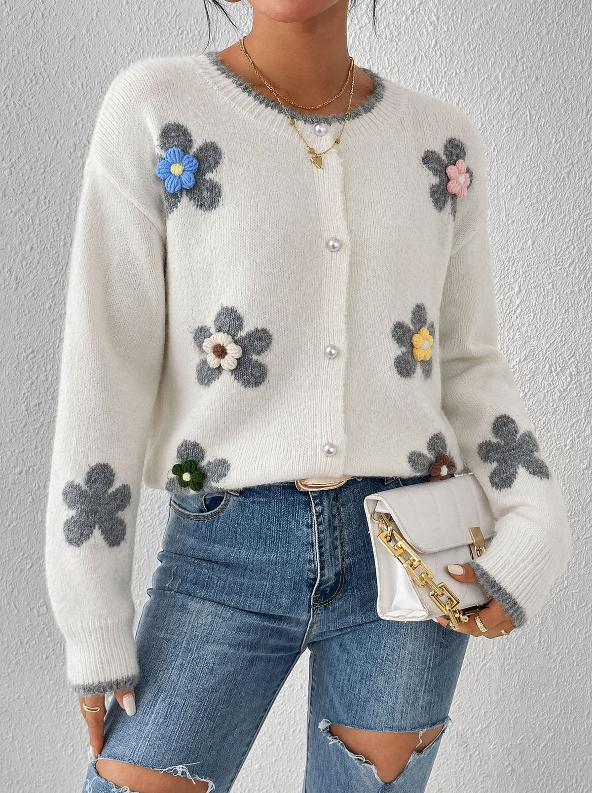 Women’s white knit cardigan with 3D flower patches, round neck, button front, long sleeves