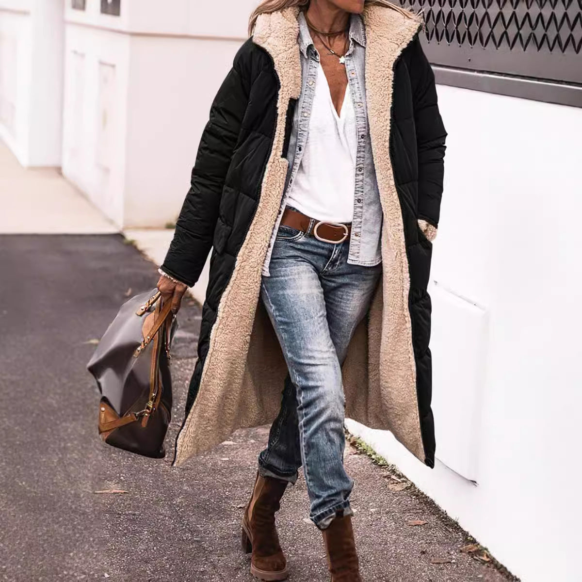 Hooded padded jacket in black with beige sherpa lining and long sleeves