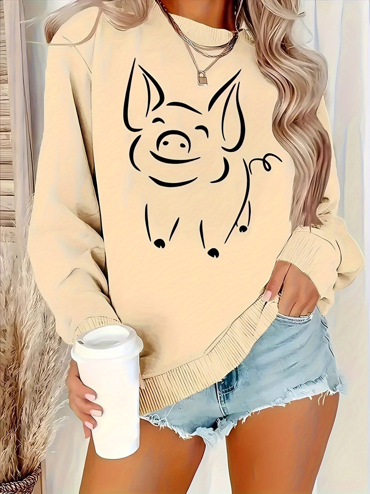 Light beige women’s pullover hoodie with large smiling cat face print