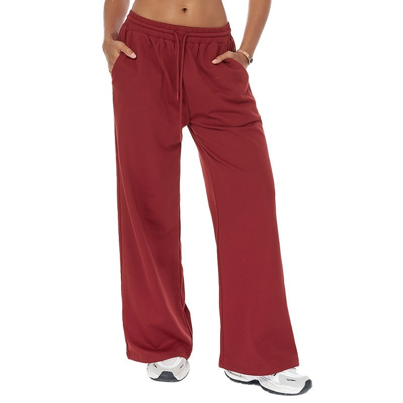 High-waisted loose sweatpants with straight legs and drawstring waist, red