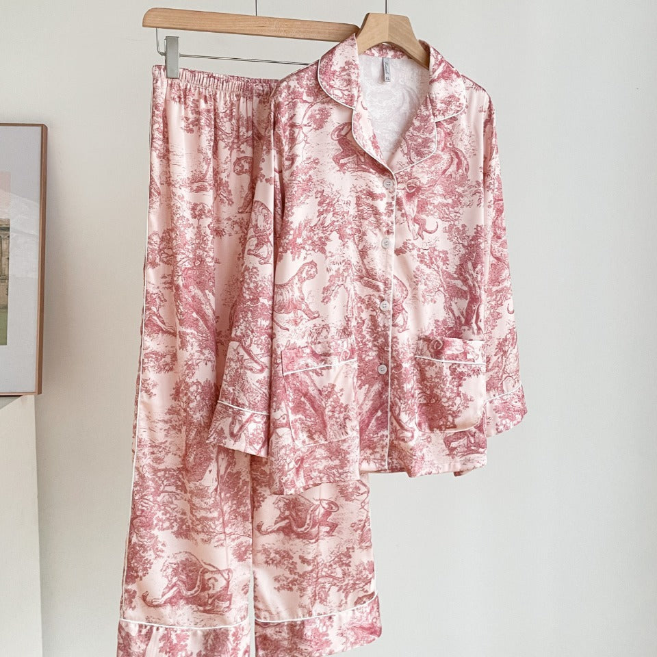 Girls’ pink jungle print pajama set with button-up shirt and matching pants
