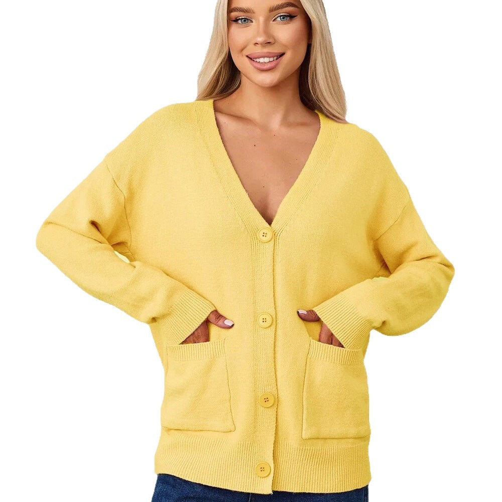 Women's yellow knit V-neck cardigan with button front and front pockets, long sleeves