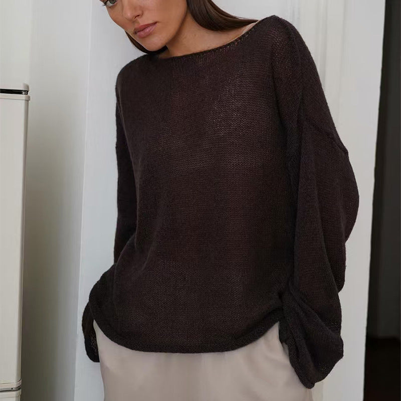 Dark brown women’s loose knit sweater top with round neck and long sleeves, relaxed fit