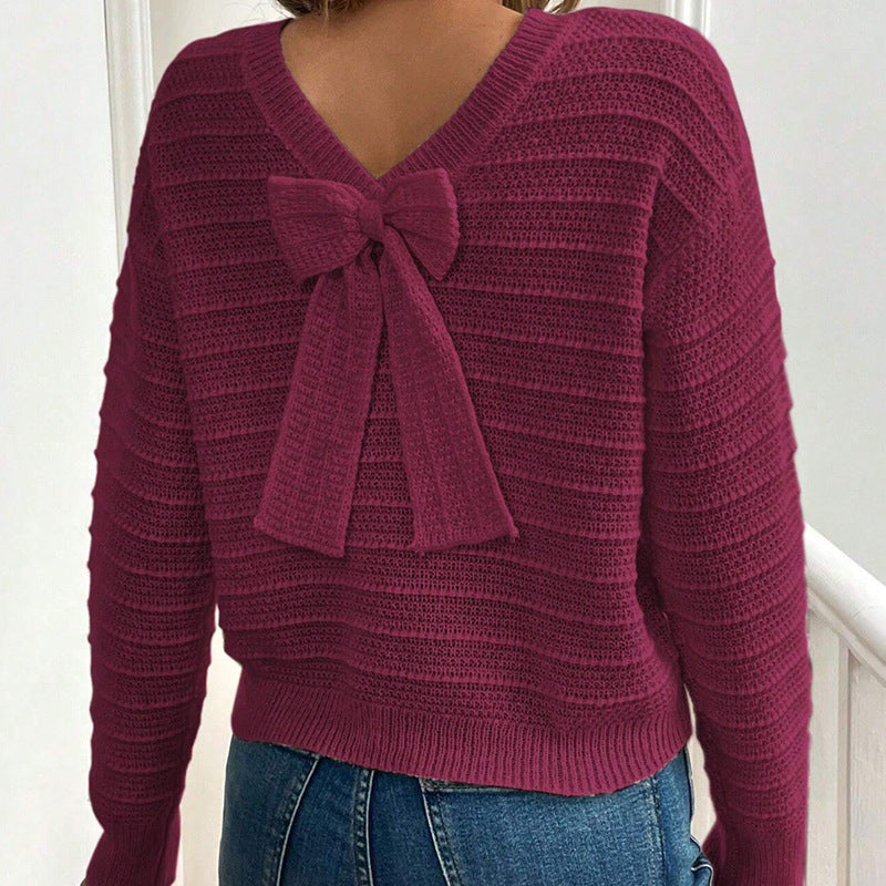 Burgundy knit sweater with back bow detail and V-back neckline