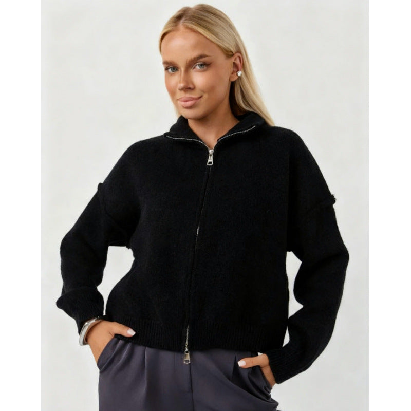Women’s oversized zip-up cardigan sweater, black funnel neck, full-zip front.